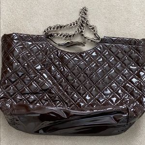 Brown patent leather tote bag.